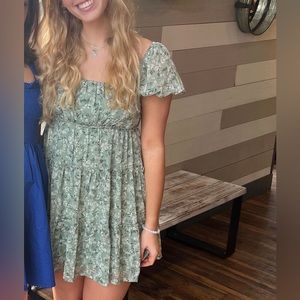 Beautiful Francesca’s floral green mini dress. So flattering!